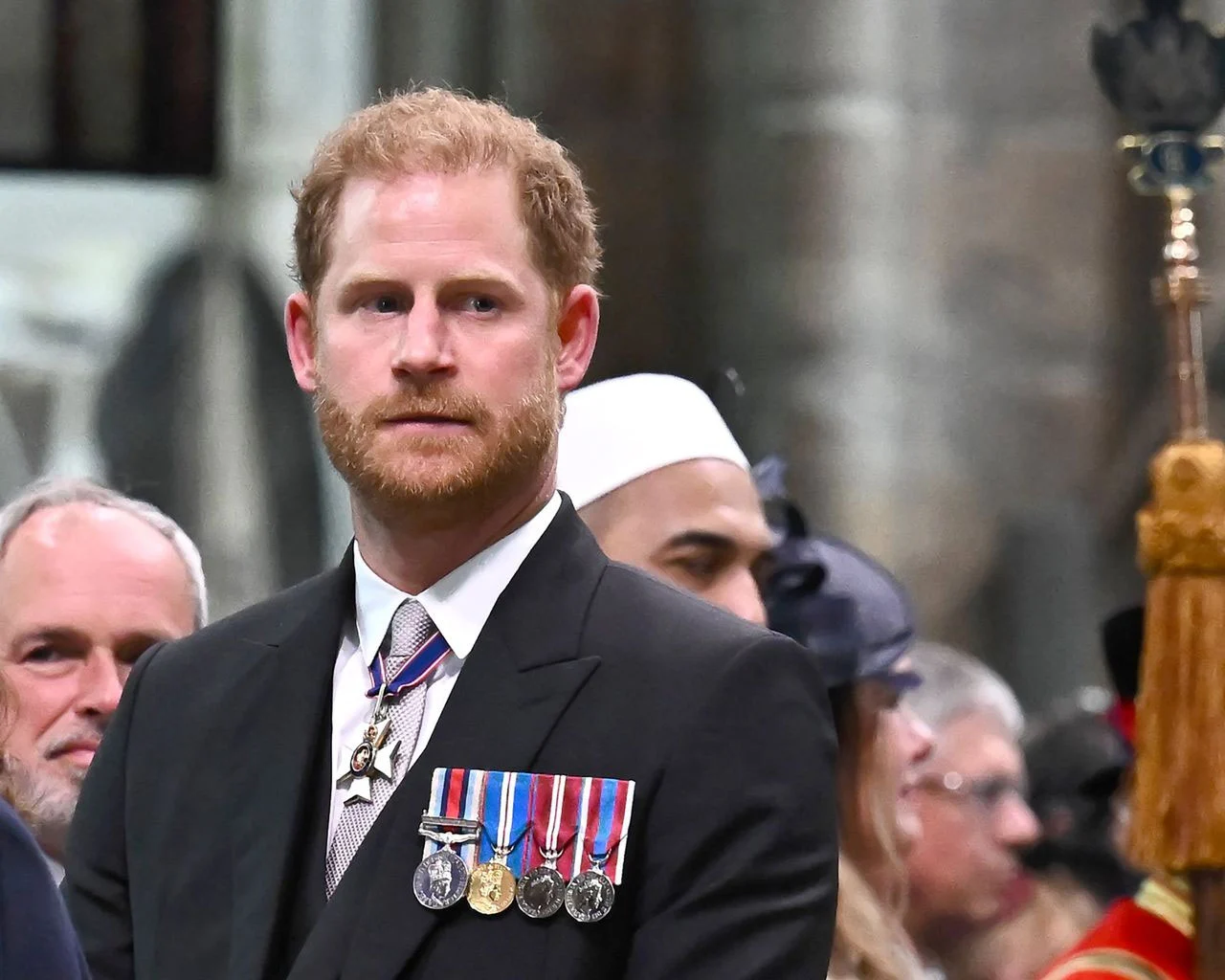 prince-harrys-awkward-appearance-at-coronation-sparks-criticism