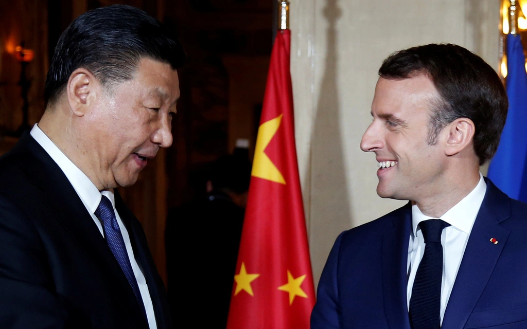 macron-heads-to-china-leaving-behind-the-burning-paris