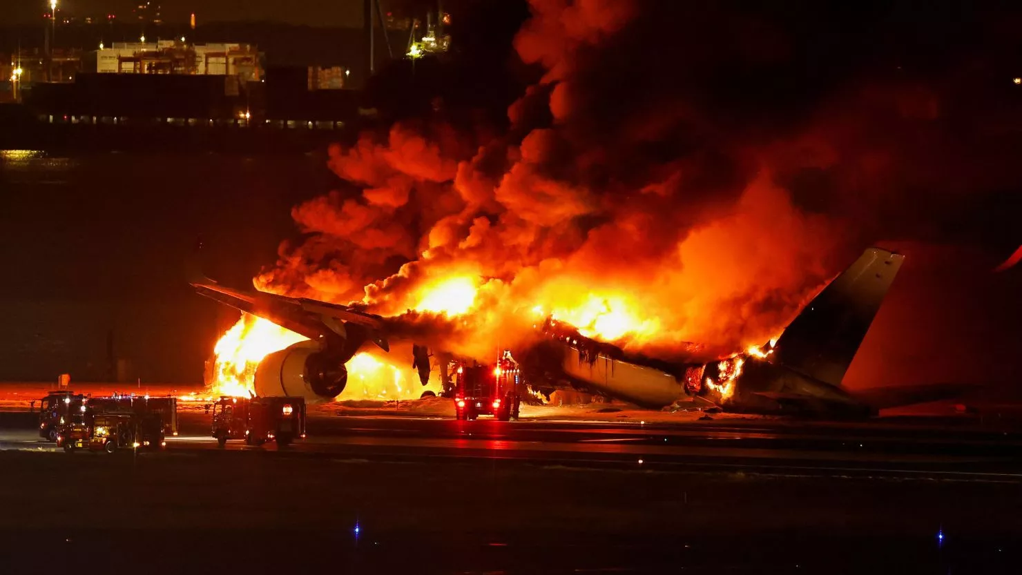 plane-catches-fire-at-the-runway-of-japans-haneda-airport-passengers-reportedly-got-out-safely