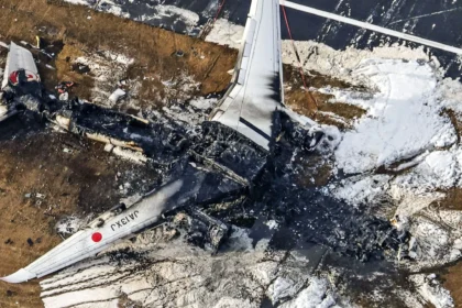 crews-at-haneda-airport-begin-clearing-plane-wreckage-from-japan-runway-collision
