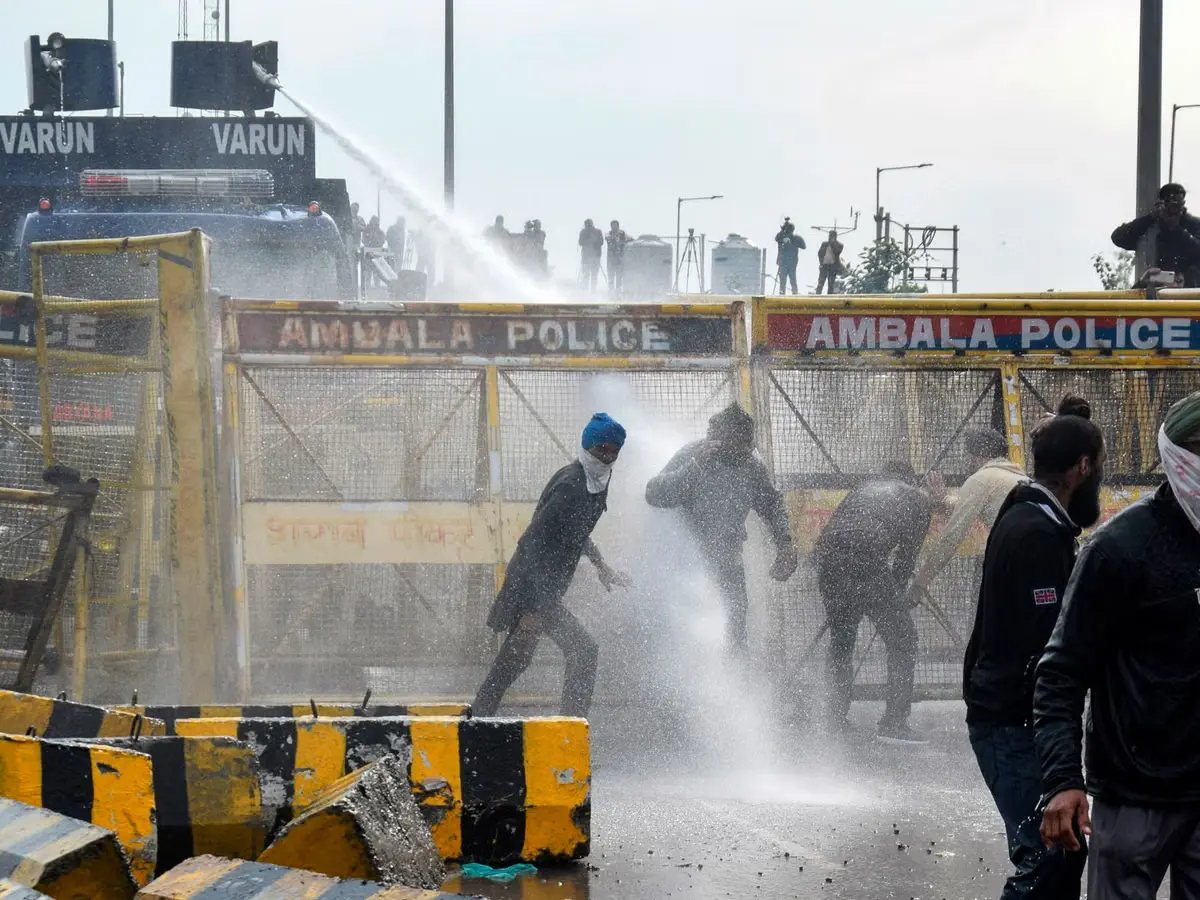 indian-police-fire-tear-gas-to-stop-thousands-of-protesting-farmers-march-to-new-delhi