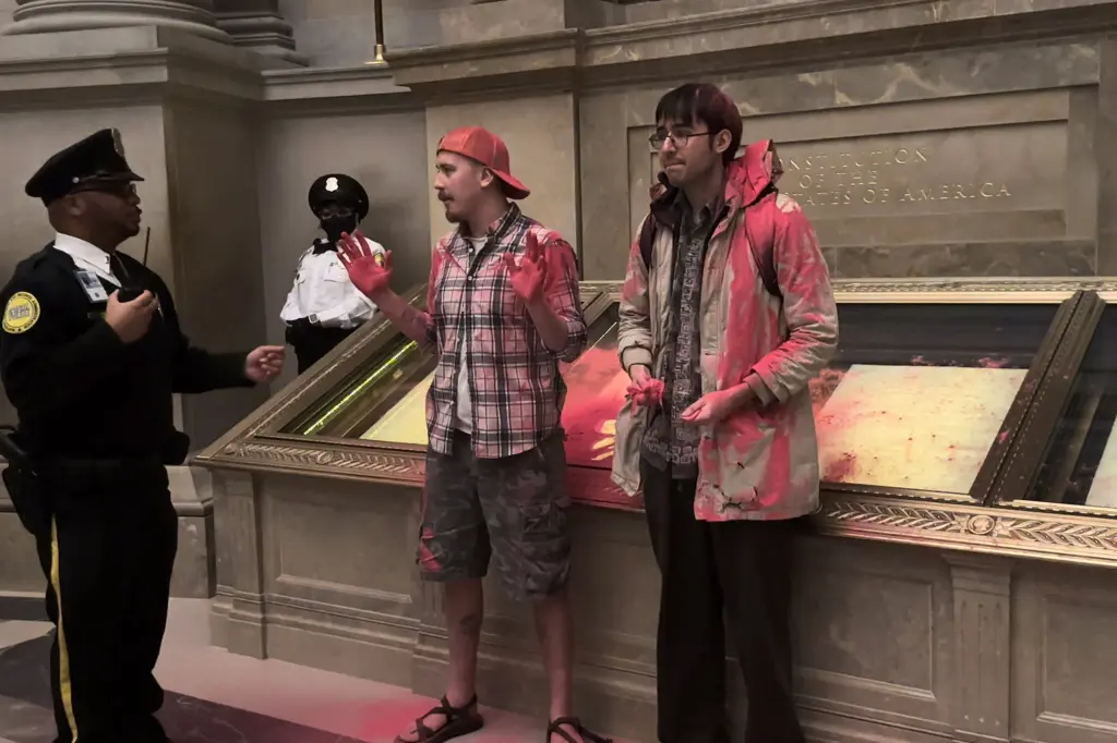 museum-closed-to-clean-after-climate-protesters-dump-powder-on-case-covering-us-constitution